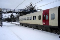 Ic3 trainset MFA 5062/MFB 5262 (named Mathilde Fibiger) photographed in Taulov 24. February 2005.  The Ic3 was built by ABB Scandia in Denmark. Each unit consists of 3 coaches. Built in a number of 92 trainsets. The trainsets were put in service in 1989 - 1998. 4 diesel engines of 294 kW per trainset. Max speed 180 km/h - 112 mph. Length 58 800 mm. Weight 97 metric tonnes. 16 seats 1st class, 128 seats 2nd class. Up to 5 trainsets can be put together. The MFA 5062/MFB 5262 was put in service in 1992.